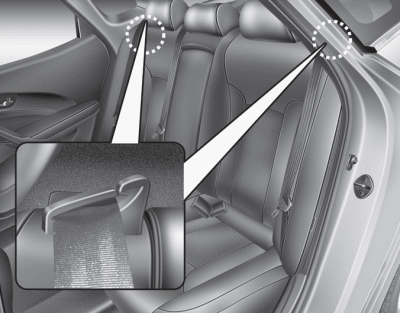 1. Make sure the rear seat belt webbing is in the guide to prevent the seat belt