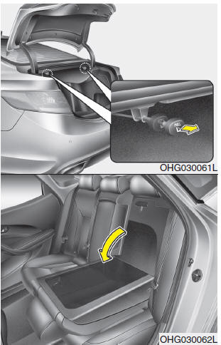 4. Pull out the seatback folding lever, then fold the seat toward the front of