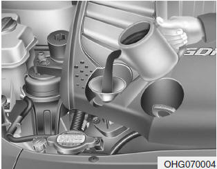 If it is near or at L (Low), add enough oil to bring the level to F (Full). Do